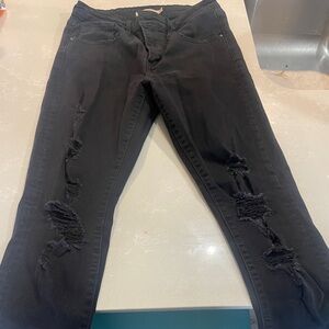 721 Levi’s High Rise Distressed Black Skinny Jeans